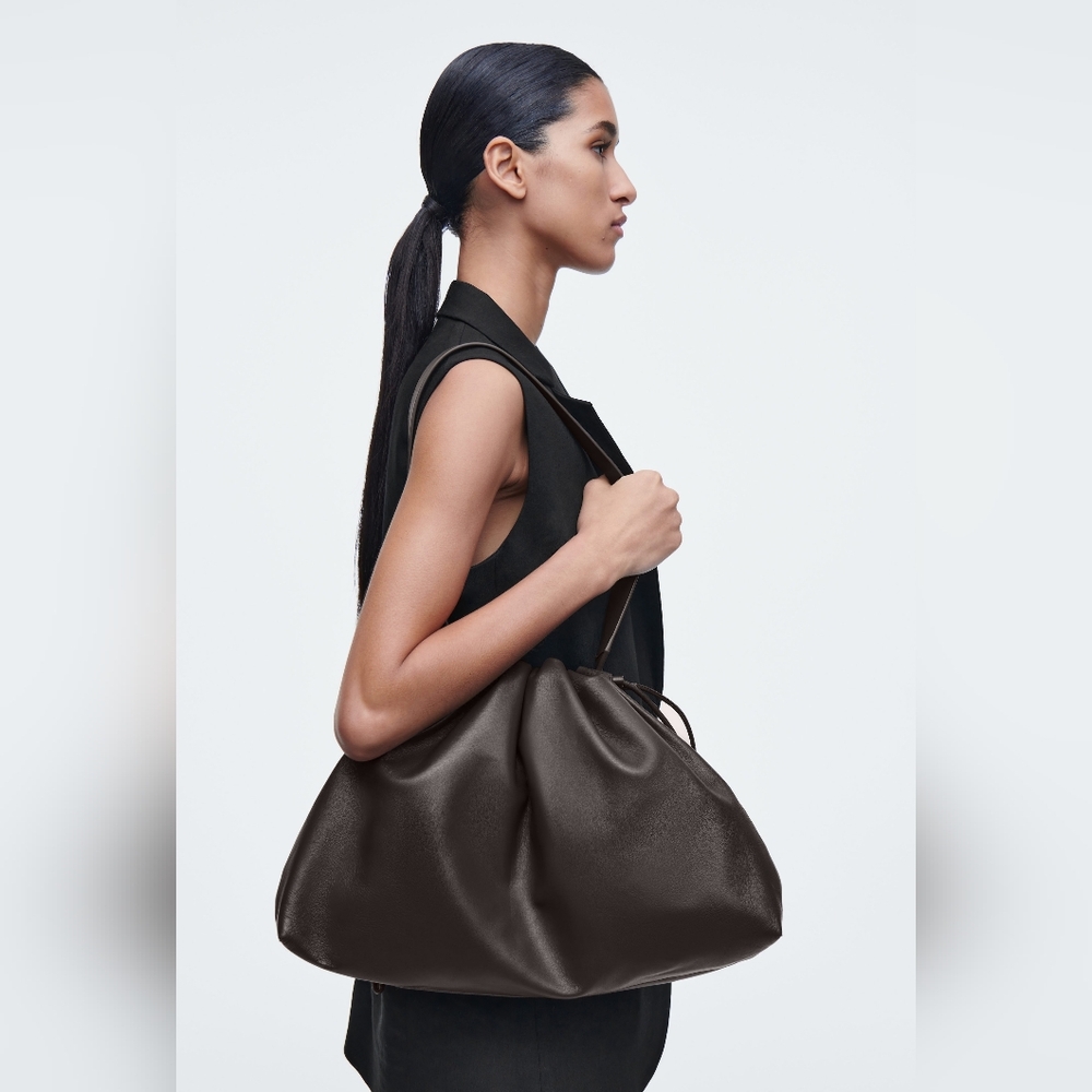COS Cavatelli Clutch Bag In Brown